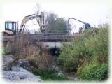 Nettoyage d'un aqueduc de la SNCF